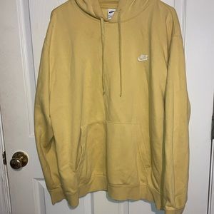 Soft yellow men’s Nike hoodie